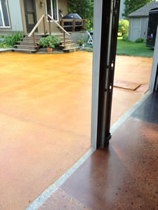 After: Polished Concrete Driveway in Milwaukee, Wisconsin. Polished Concrete can be used inside and outside. Here, you can see a driveway and a garage